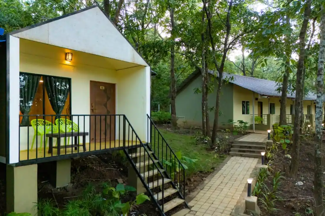 Pathway leading to forest cottages at Rain Forest Resort Dandeli